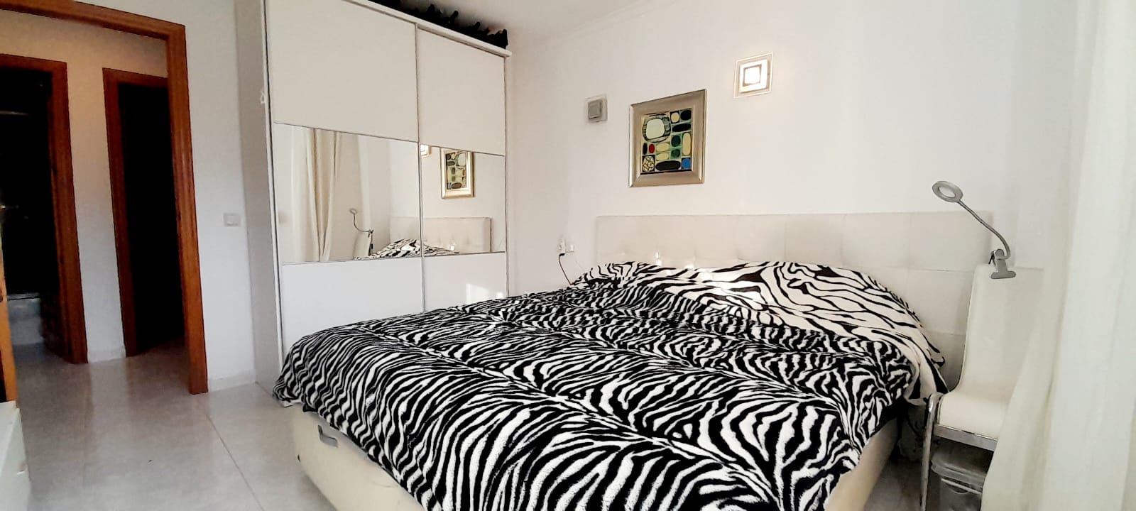 Casa adosada en Benitachell con 2 habitaciones y piscina comunitaria.