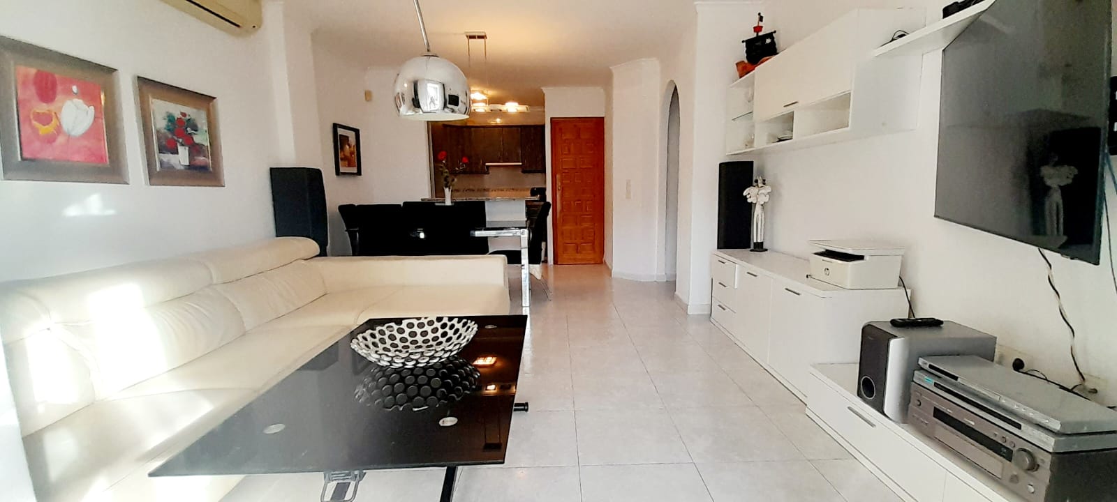 Casa adosada en Benitachell con 2 habitaciones y piscina comunitaria.