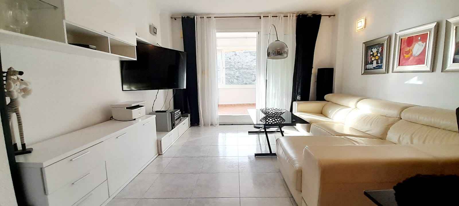 Casa adosada en Benitachell con 2 habitaciones y piscina comunitaria.