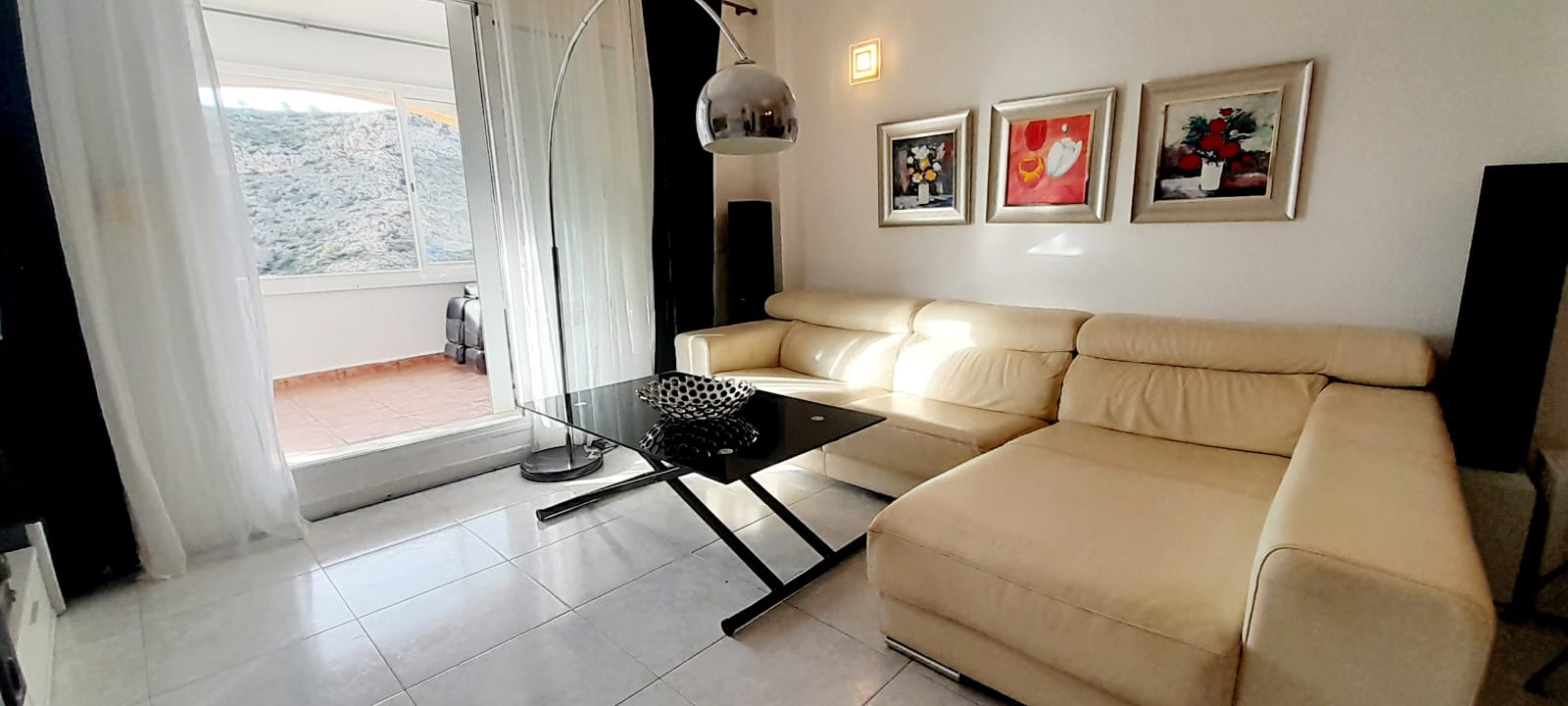 Casa adosada en Benitachell con 2 habitaciones y piscina comunitaria.